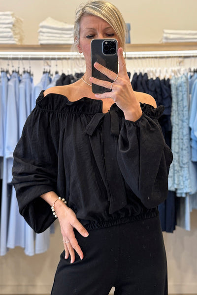 Elegant Women's Black Off-Shoulder Blouse with Frill Details and Knot Front, Long Sleeve Stylish Top for Any Occasion