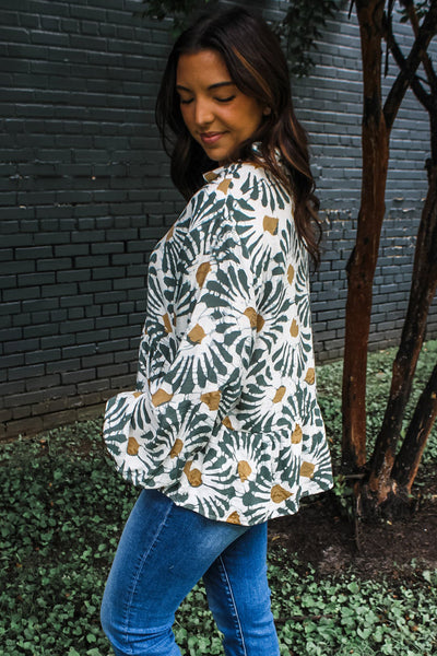 Women's Trendy Green Abstract Floral Long Sleeve Top with Ruffle Hem Stylish Spring Fashion for a Chic Look