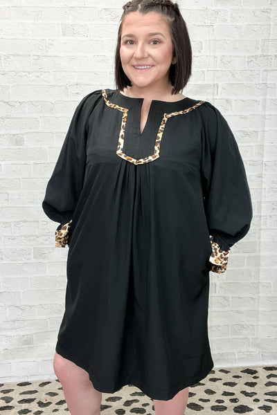 Plus Size Women's Effortless Black Shift Dress with Notched Neck, Flounce Long Sleeves, and Chic Leopard Trim