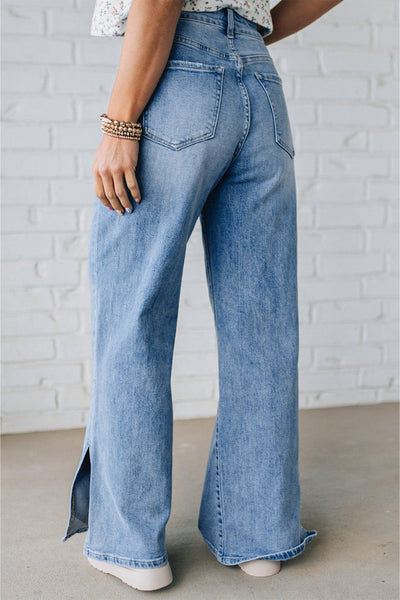 Trendy High-Waisted Women's Distressed Jeans with Slit Legs in Classic Blue for Effortless Everyday Style
