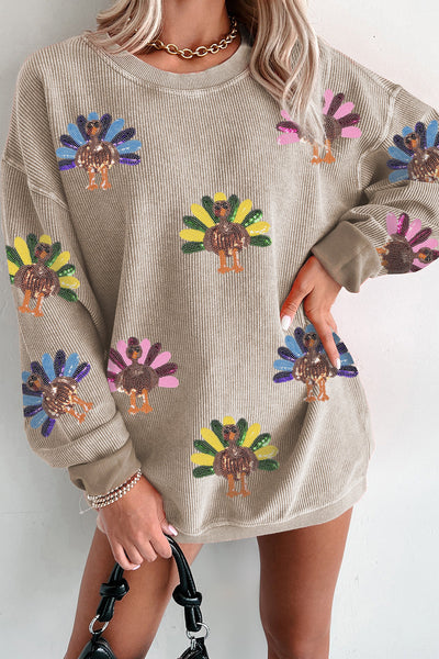 Women's Sequin Turkey Corded Oversized Sweatshirt in Smoke Gray made for easy styling and wardrobe coordination, with premium-like structure and