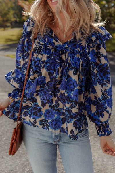 Chic Women's Blue Floral Blouse with Tassel Tie Neck, Ruffle Trim, and Long Puff Sleeves for Effortless Style