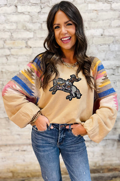 Women's Light Beige Sequin Rodeo Graphic Sweatshirt with Aztec Sleeves made for easy styling and wardrobe coordination, with premium-like structure