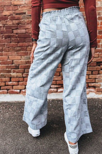 Stylish Women's Sky Blue Loose Denim Pants with Frills, Elastic Waist, and Checkered Design for Comfort and Versatility