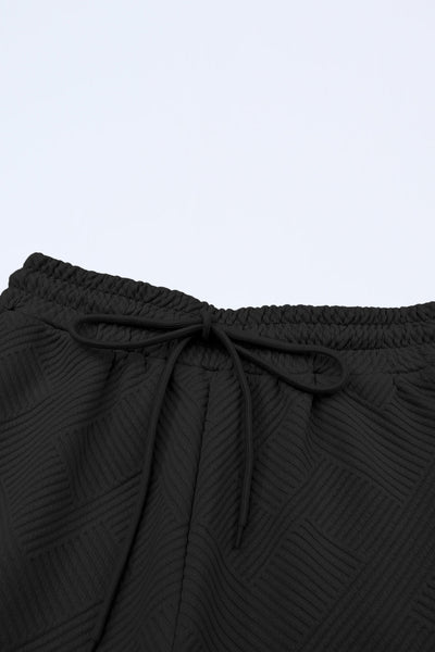 Chic Black Textured T-Shirt and Drawstring Pants Set for Women - Effortless Loose Fit Everyday Style