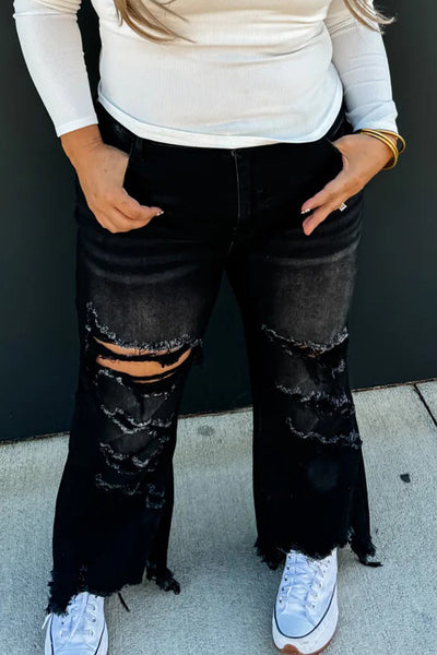 Trendy Women's Black Asymmetric Distressed Cowgirl Jeans with Raw Hem - Chic Fit for Casual Everyday Style