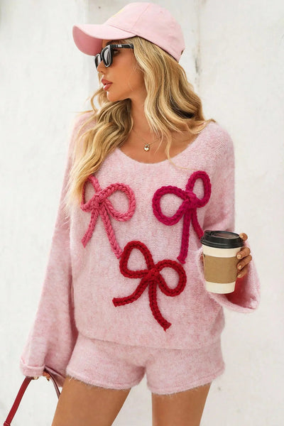 Cozy Women's Pink Baggy Sweater with Braided Bow Detail & Round Neck Stylish Knitwear for All Seasons