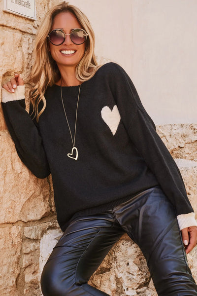 Women's Cozy Black Heart Sweater with Contrast Cuffs, Relaxed Fit for Casual Outings and Stylish Layering