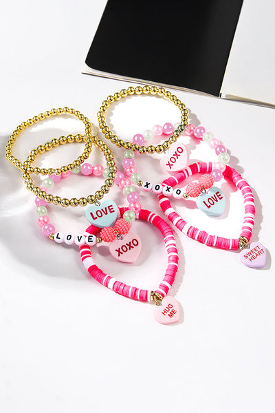 Women's Pink and Gold PMMA Heart Charm Stackable Bracelet Set with practical styling and dependable silhouette control.