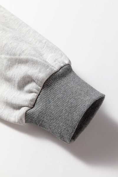 Trendy Women's Dark Grey LOVE Graphic Sweatshirt with Exposed Seams & Stylish Asymmetrical Hem for Effortless Chic Look