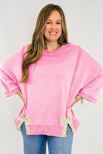 Women's Pink Floral Bow Sweatshirt with Exposed Seams and Slits with practical styling and dependable silhouette control.