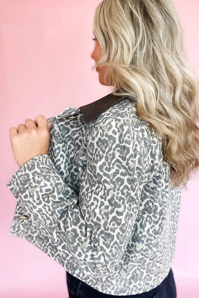 Women's Black Leopard Print Jacket with Button Flap, Contrast PU Leather Collar, Stylish Patchwork Design made for easy styling and wardrobe