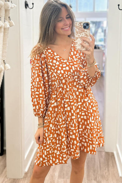 Women's Flowy Orange Geometric Short Dress with Tasseled Lace-Up V-Neck and Empire Waist for Effortless Summer Style