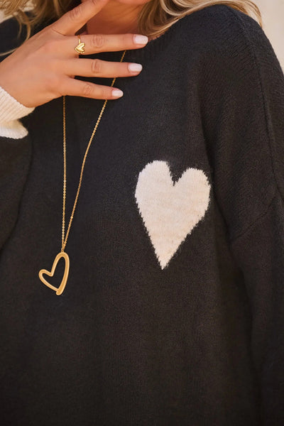 Women's Cozy Black Heart Sweater with Contrast Cuffs, Relaxed Fit for Casual Outings and Stylish Layering