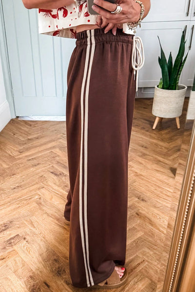 cinnamon wide leg women's pants with varsity stripes and comfortable drawstring waist for effortless style made for easy styling and wardrobe with
