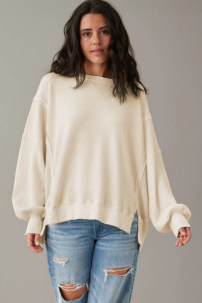 Women's Oversized White Waffle Knit Top with Bishop Sleeves and Trendy Split Detail for Effortless Chic Style