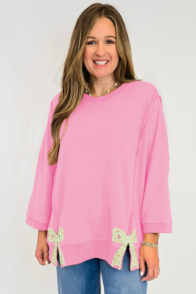 Women's Pink Floral Bow Sweatshirt with Exposed Seams and Slits with practical styling and dependable silhouette control.