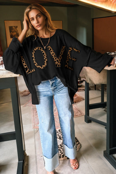Women's Black Oversized Leopard LOVE Graphic Pullover Sweatshirt made for easy styling and wardrobe coordination, with premium-like structure and