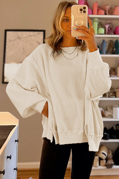 Women's Oversized White Waffle Knit Top with Bishop Sleeves and Trendy Split Detail for Effortless Chic Style