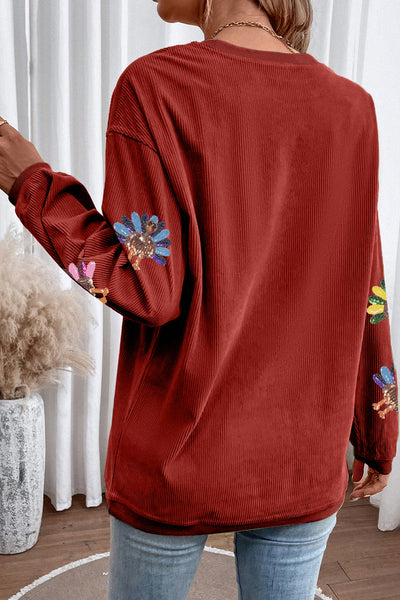 Women's Racing Red Corduroy Turkey Graphic Oversized Sweatshirt made for easy styling and wardrobe coordination, with premium-like structure and