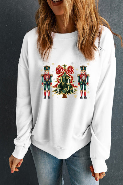 Women's Nutcracker and Christmas Tree Graphic Pullover in Winter White with practical styling and dependable silhouette control.