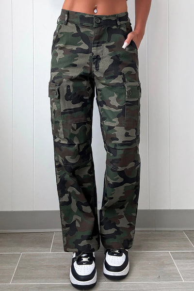 stylish women's green camouflage loose fit pants with button flap pockets and trendy patch accents made for easy styling and wardrobe coordination,