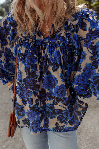 Chic Women's Blue Floral Blouse with Tassel Tie Neck, Ruffle Trim, and Long Puff Sleeves for Effortless Style