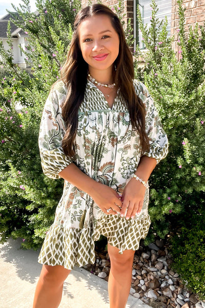 Plus Size Women's Green Floral Mini Dress with Tie Neck, Half Sleeves, and Relaxed Fit for Effortless Spring Style