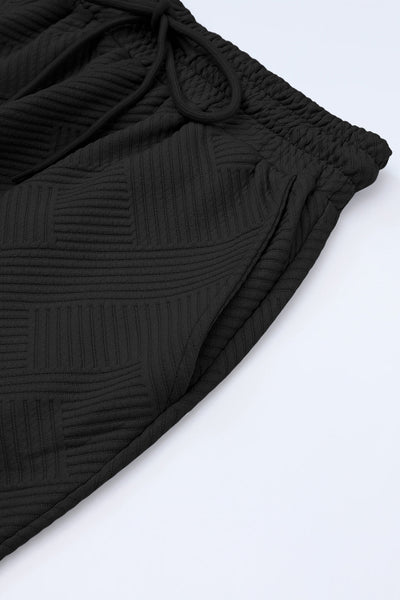 Chic Black Textured T-Shirt and Drawstring Pants Set for Women - Effortless Loose Fit Everyday Style