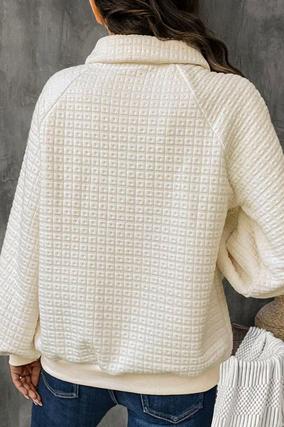 women's beige pineapple texture half-button pullover with puff sleeves made for easy styling and wardrobe coordination, with premium-like structure