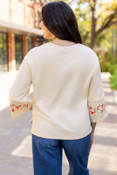 Women‚Äôs Beige Floral Graphic Blouse with Exposed Seams and Wide Sleeves - Perfect for Casual Chic Style