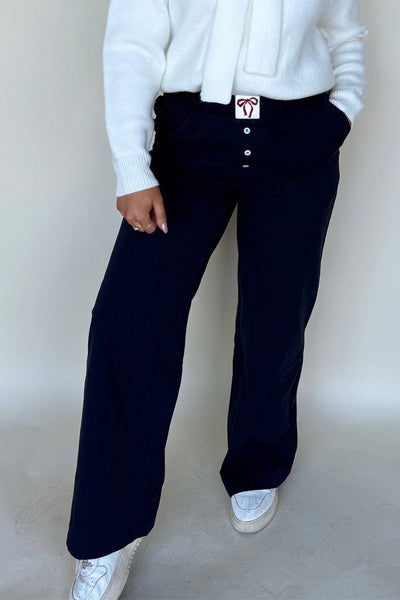 Stylish Women's Black Bow Tie Loose-Fit Pants with Elastic Waist and Button Accents for Ultimate Comfort and Versatility