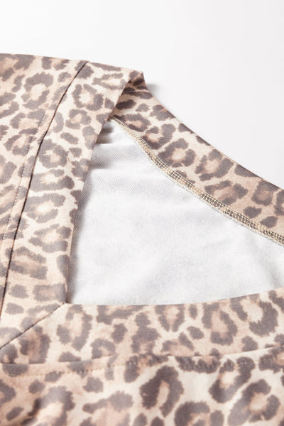 Women's Light French Beige Leopard V-Neck Pullover and Mini Skirt Set with practical styling and dependable silhouette control.