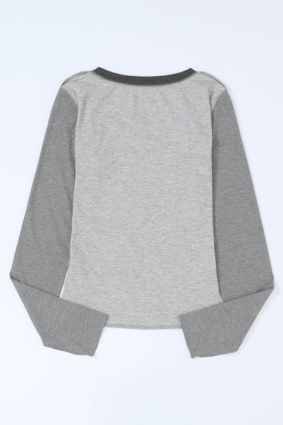 Trendy Women's Gray Color Block Ribbed Knit Top with Exposed Seams for a Comfortable and Chic Everyday Look