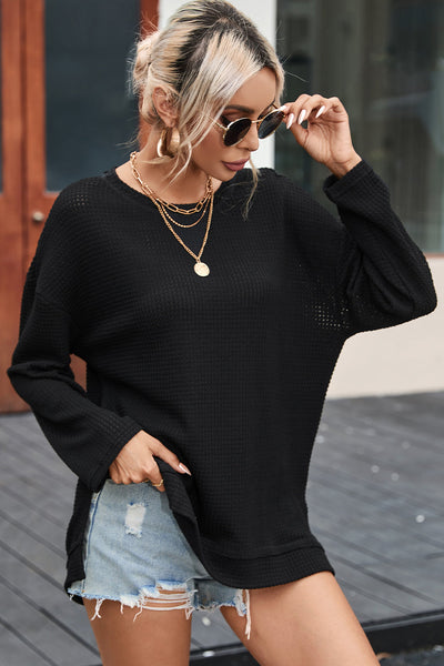 Chic Women's Black Oversized Waffle Knit Top with High Slits - Cozy and Stylish for Casual Outings and Everyday Wear