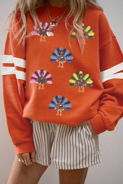 Women's Sequin Turkey Varsity Striped Sweatshirt in Burnt Orange made for easy styling and wardrobe coordination, with premium-like structure and