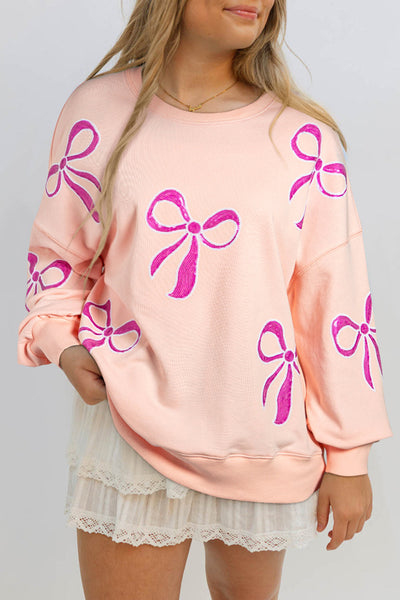 Trendy Oversized Apricot Pink Sweatshirt for Women with Sequined Bowknot - Stylish Comfort for Casual Wear