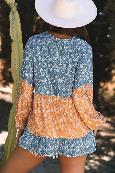 Trendy Women's Orange Floral Color Block Blouse with Ruffled Hem - Stylish Round Neck Top for Any Occasion