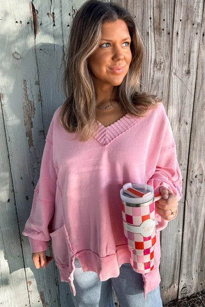 Casual Women's Pink Ribbed V-Neck Pullover Sweater with Raw Seams, Side Pockets, and Trendy Split Hem - Relaxed Fit