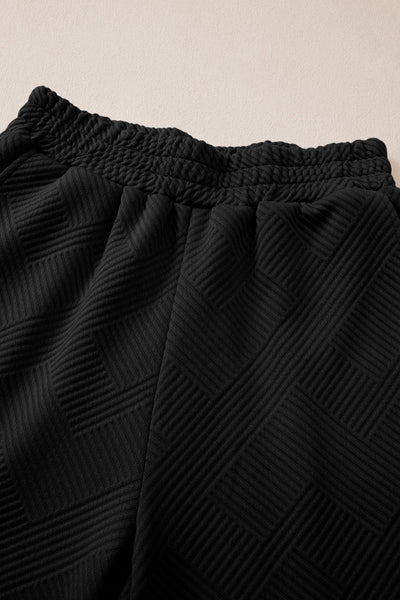 Chic Women's Black Textured V-Neck Collared Top with Wide Leg Pants Set - Stylish, Comfortable Outfit for Casual Outings