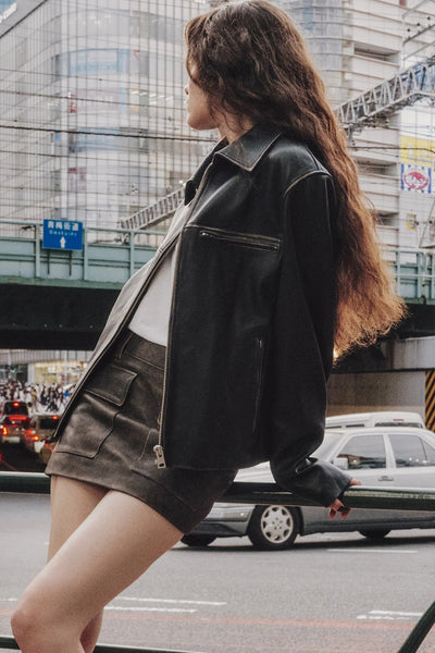 Trendy Women's Black Faux Leather Jacket with Zip Slits and Pockets for Effortless Street Style Fashion