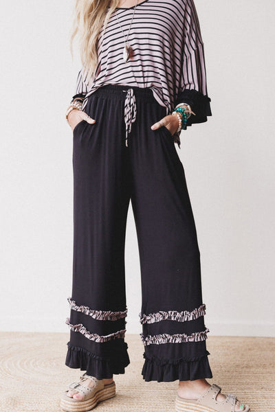 Stylish Black Striped 2-Piece Women's Set: Relaxed Drop Shoulder Top with Ruffled Sleeves & Comfy Drawstring Pants