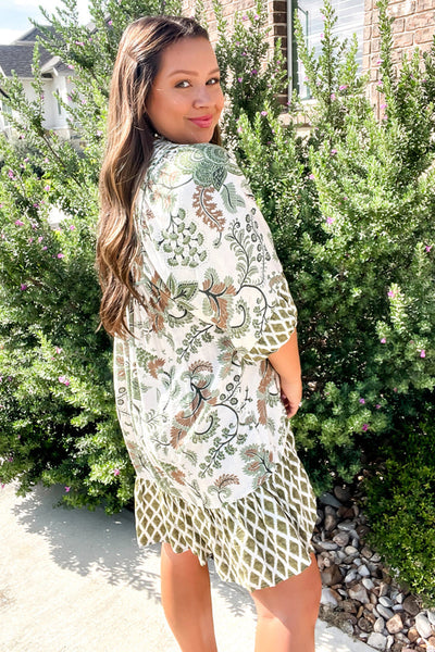Plus Size Women's Green Floral Mini Dress with Tie Neck, Half Sleeves, and Relaxed Fit for Effortless Spring Style