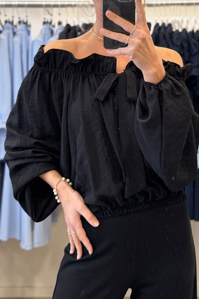Elegant Women's Black Off-Shoulder Blouse with Frill Details and Knot Front, Long Sleeve Stylish Top for Any Occasion