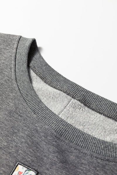 Trendy Women's Dark Grey LOVE Graphic Sweatshirt with Exposed Seams & Stylish Asymmetrical Hem for Effortless Chic Look
