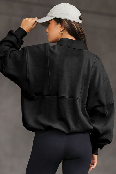 Women's Oversized Black Half-Zip Sweatshirt with Ribbed Texture