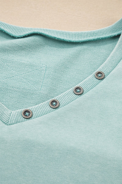 Effortless Women's Mist Blue V-Neck Pullover Top with Exposed Seams & Button Detail for Chic Casual Style
