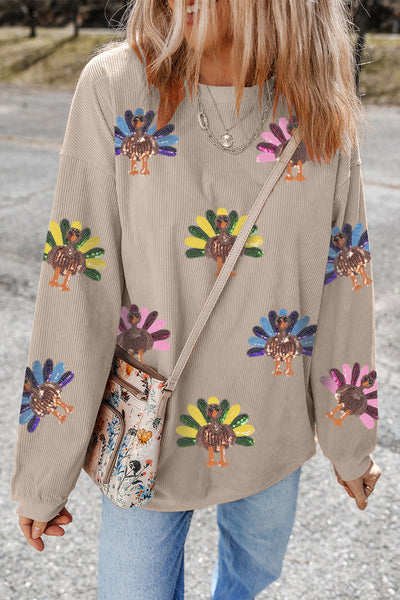 Women's Sequin Turkey Corded Oversized Sweatshirt in Smoke Gray made for easy styling and wardrobe coordination, with premium-like structure and