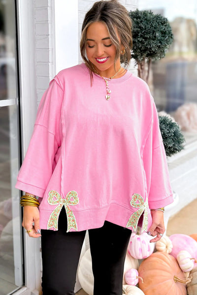 Women's Pink Floral Bow Sweatshirt with Exposed Seams and Slits with practical styling and dependable silhouette control.