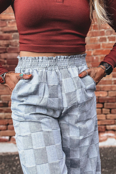 Stylish Women's Sky Blue Loose Denim Pants with Frills, Elastic Waist, and Checkered Design for Comfort and Versatility